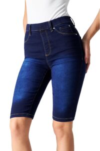 Mörkblå knälånga jeggings med hög midja, fickor och kontrastsömmar.