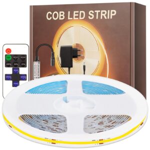 Vit LED-list på spole med fjärrkontroll och förpackning i bakgrunden.