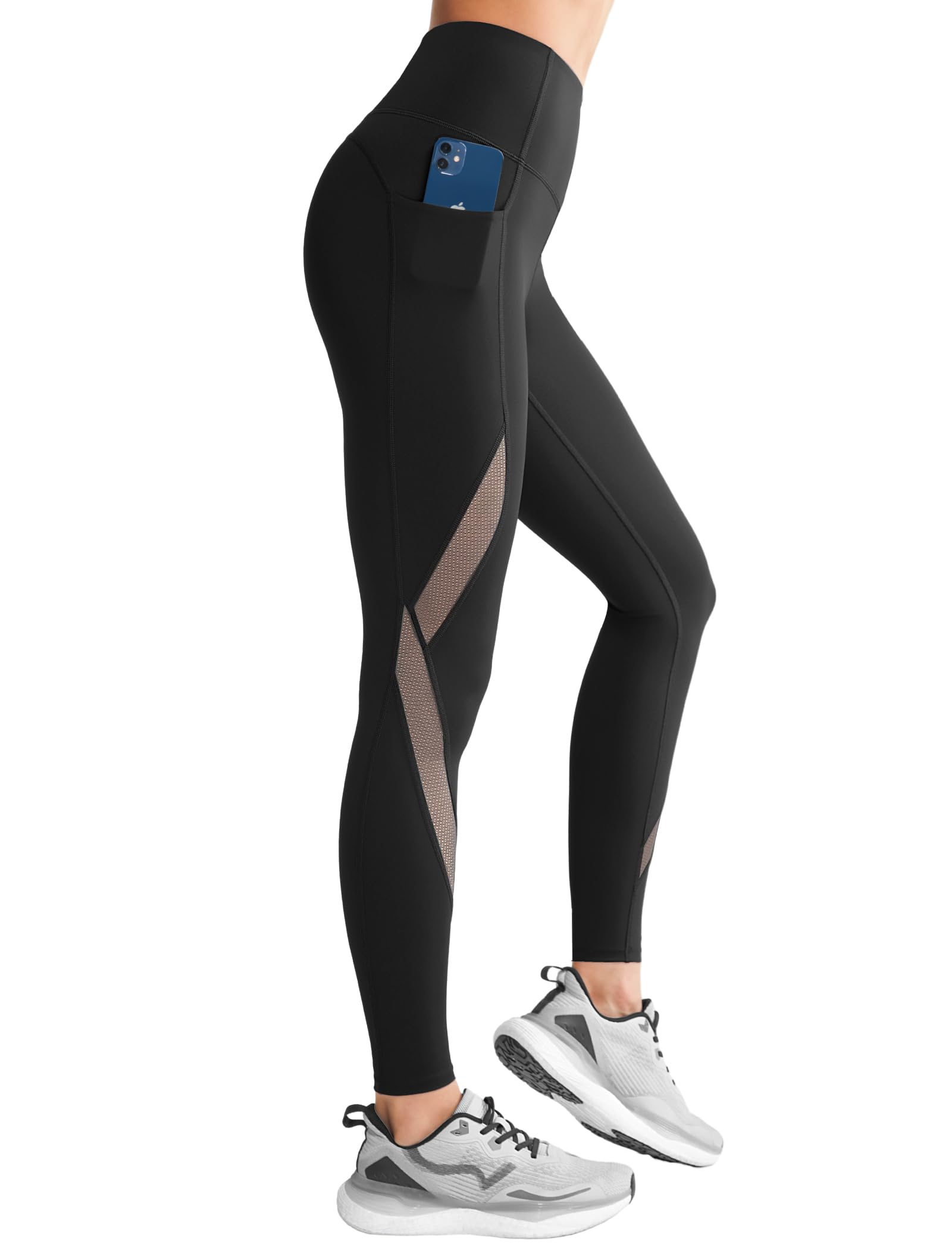 Svarta träningsleggings med hög midja och sidoficka, visade på modell.