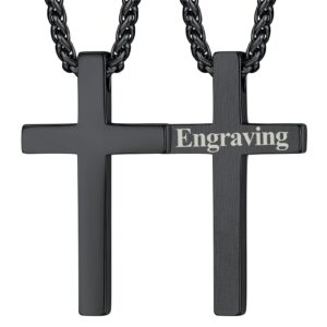 Svart korshalsband med kedja och texten ”Engraving” på korset