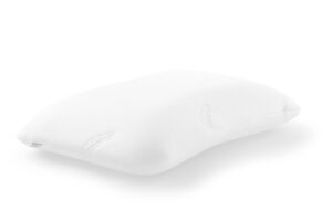 Vit ergonomisk nackkudde med vågform och strukturerat överdrag.