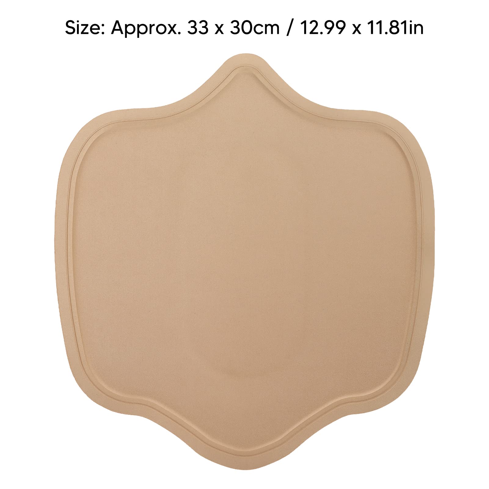 Beige bukkompressionsplatta med konturerad form, fotograferad framifrån.